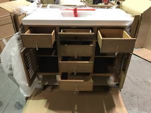 lot 32 image: Cotherstone 48 in. W x 22 in. D Bath Vanity in Almond Toffee with Cultured Stone Vanity Top in White with White Basin by Home Decorators Collection Customer Returns See Pictures