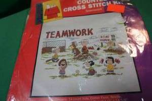 lot 200 image: Peanuts Counted Cross Stitch Kit Teamwork