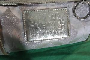 lot 33 image: Silver Coach Poppy Purse