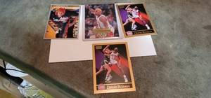 lot 15 image: 4 Dennis Rodman Trading Cards