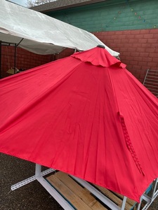 lot 31 image: Red Patio Umbrella, Missing Bottom Pole