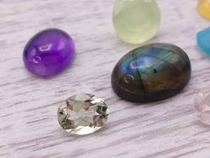 36.98 Carat Lot of Gemstones Opal, Labradorite, Topaz, Amethyst, etc.