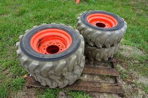 lot 38 image: Non-Marking Skid Steer Tires on Wheels