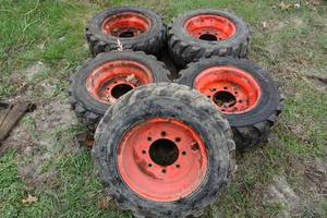 lot 39 image: 5 Skid Steer Tires on Wheels