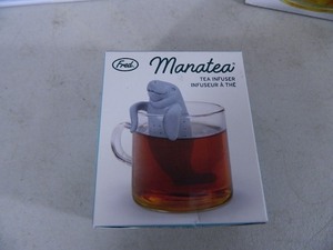lot 61 image: New Tablecloths, Champagne Glasses, Tea Infuser