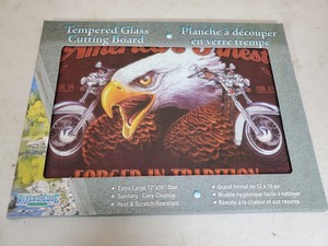lot 73 image: New Tempered Glass Motorcycle Themed Cuttingboard