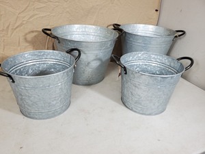 lot 74 image: 4 New Galvanized Planters with Drain Holes