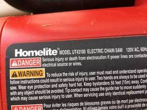 lot 177 image: Homelite  14 Inch Electric Chainsaw