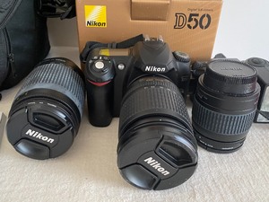 lot 213 image: Nikon SLR D50 Camera with Three Lenses and Camera Bag
