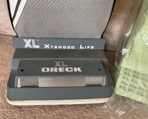 lot 296 image: Oreck XL Vacuum with Extra Bags