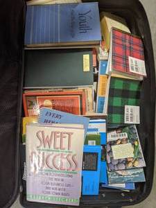 lot 209 image: No Way, Another Rolling Suitcase Full of Books