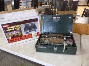 lot 11 image: New Coleman Dual Fuel Compact Stove