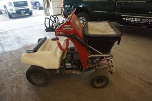 lot 7 image: Toro Model 34230 Stand On SprayerSpreader