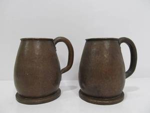 lot 243 image: Matching Pair of Antique hand Hammered Copper Beer MugsTankards