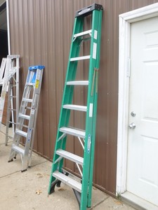 8 green werner fiberglass ladder. Good used condition. As shown.