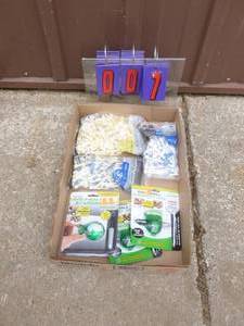 Flat of golf accessories. As shown.
