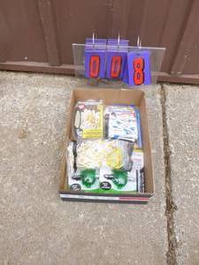 Flat of golf accessories. As shown.