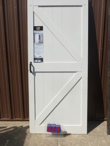 36 x 84 Barn door. No brackets or rail included. Has minor scuffs & dings. As shown.