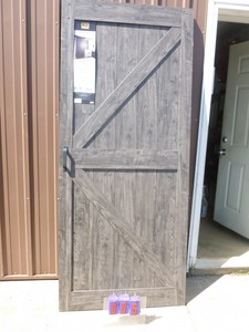 36 x 84 Barn door. No brackets or rail included. Has minor scuffs & dings. As shown.