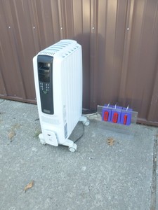 Oil filled radiant heater. Tested & works. As shown.