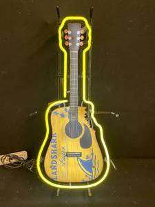 lot 5 image: Landshark guitar neon