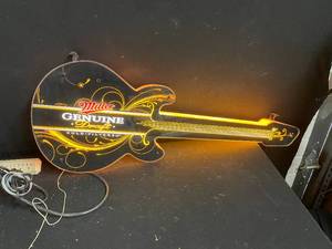 lot 41 image: Miller Genuine Draft fluorescent backlit guitar