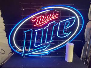 lot 107 image: Jumbo Miller Lite with blue hoops neon