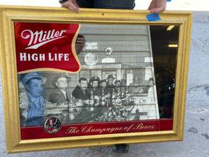 lot 129 image: Miller High Life mirror with screen printed old black and white photo background