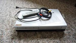 lot 99 image: Zenith DVDVHS Player with Remote