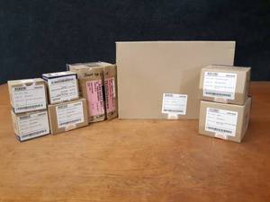 lot 1625 image: Lot of (8) Navien Tankless Water Heater Parts