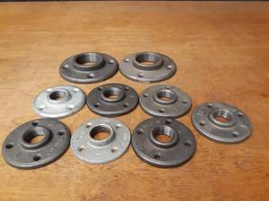 lot 1694 image: Lot of (9) 2 & 1 NPT Floor  Ceiling Pipe Mounts