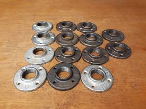lot 1695 image: Lot of (14) 1-14  NPT Floor  Ceiling Pipe Mounts