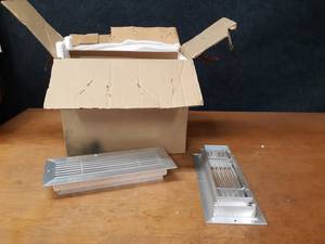 lot 1703 image: Case of (6) Aluminum Vent Covers - Fits Duct 12 x 4