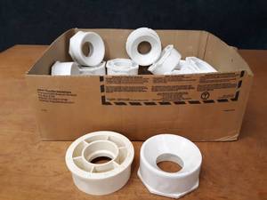 lot 1762 image: Lot of (17) 4 x 2 PVC DWV Bushings