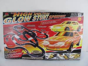 lot 2 image: New in Box Hi Voltage Glow Stunt Speedway