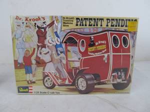 lot 205 image: Vintage Revell Dr. Krooks Patent Pending Traveling Medicine Show Vehicle