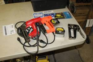 lot 78 image: Plastic Tool Caddy    with Hand Tools - Electric Staplers, Hand Stapler, Tape Measures, Staples, Misc. Hardware
