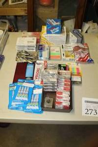 lot 273 image: Lot of Office Supplies    with Notepads, Paper Clips, Paper Punches, Rubber Bands, Super Glue, Journal, Velcro