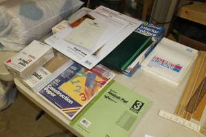 lot 277 image: Lot of Office Supplies    with Folders, Notepads, Sheet Protectors, Laminating Pouches, Filler Paper, Construction Paper