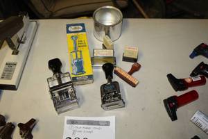 lot 280 image: Lot of (7) Office Supplies    with Price Marker Stamps (x3), Other Stamps (x4)