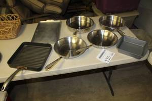 lot 125 image: Lot of (7) Cooking Pans    with Square Griddle, Stainless Steel Pans, Cookie Sheet, Baking Pan