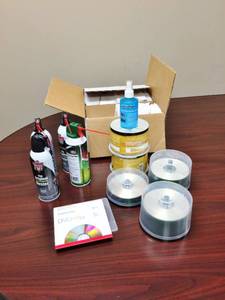 lot 75 image: Box of Cds and Various Cleaners