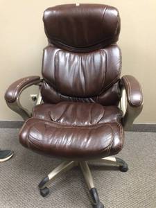 lot 101 image: MSRP $400 Bonded Leather Super Cushy&nbspExecutive Office Ergonomic Computer Desktop Armchair With Height Adjustable Seat&nbspWear & Tear But What Does That Matter If You Can Still Sleep In It