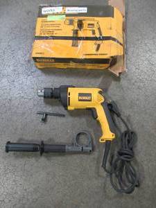 lot 20 image: DEWALT 12 in. Variable Speed Reversible Hammer Drill, DW511 - Used. - Wrong Handle and missing depth rod.