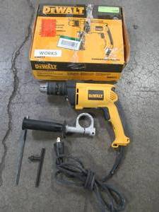 lot 21 image: DEWALT 12 in. Variable Speed Reversible Hammer Drill, DW511 - Used.