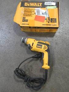 lot 22 image: DEWALT 38 in. Pistol Grip Drill Kit, DWD110K - Used.