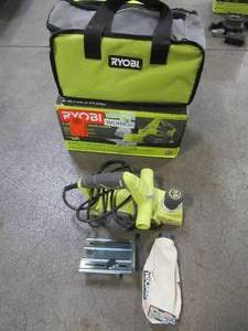 lot 39 image: RYOBI 6 Amp 3-14 in. Corded Hand Planer, HPL52K - Used.