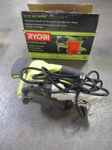 lot 55 image: RYOBI 3 in. x 18 in. Portable Belt Sander, BE319 - Used.