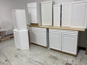 lot 58 image: LOT OF 8 HAMPTON BAY  KITCHEN CABINETS IN WHITE