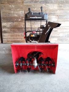 lot 19 image: New 24 in. 208 cc Two-Stage Gas Snow Blower with Electric Start Self Propelled by Troy-Bilt (Bent Handle)